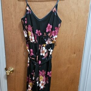Floral romper with belt .